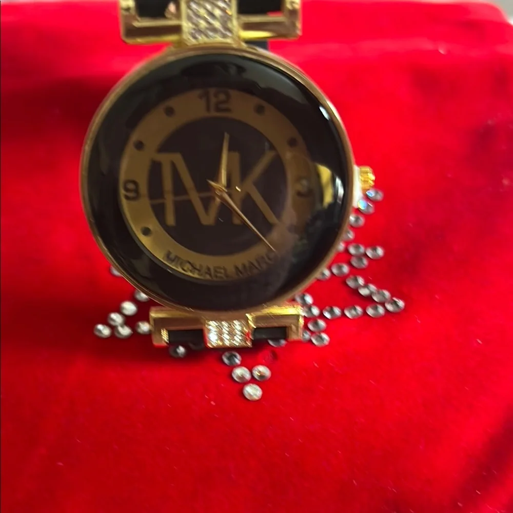 Michael Marc Black and Gold Watch